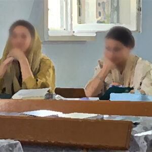 students with head coverings taking notes